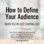 Pinterest pin with the text “How to Define Your Audience When You’re Just Starting Out” over a light background with a wood desk and blurred office scene. Subheading reads: “The first step to growing your blog is knowing who you’re writing for.”