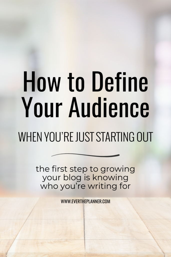 Pinterest pin with the text “How to Define Your Audience When You’re Just Starting Out” over a light background with a wood desk and blurred office scene. Subheading reads: “The first step to growing your blog is knowing who you’re writing for.”