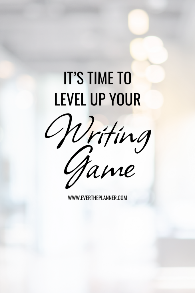 Pin graphic with the phrase “It’s time to level up your writing game” on a blurred white background with soft lights.