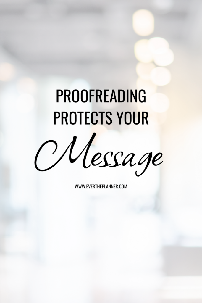 Clean pin with the quote “Proofreading protects your message” on a blurred background with soft lights.
